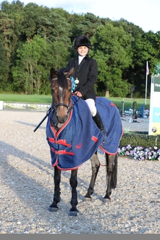 Lucky Lou lives up to her name at the NAF Five Star British Showjumping Championships Lucky Lou lives up to her name at the NAF Five Star British Showjumping Championships